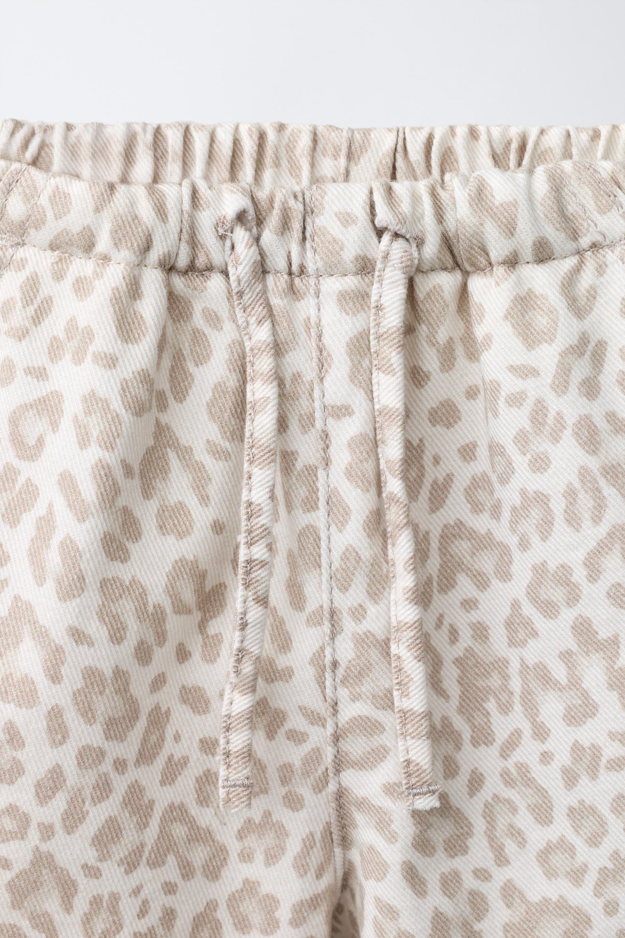 ANIMAL PRINT DENIM SHORTS